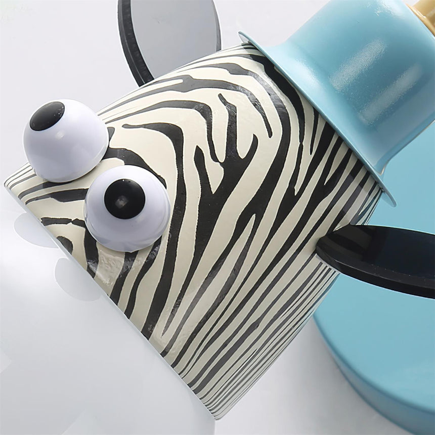 The zebra face seen close, the stripes and the round eyes