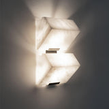 Two blocks lit on a dark ground, the glow spreading above and below