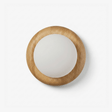Wall sconce for staircase, a solid wood disk holding a frosted glass globe