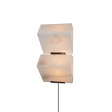 The two block lamp unlit, the white stone and dark bracket visible