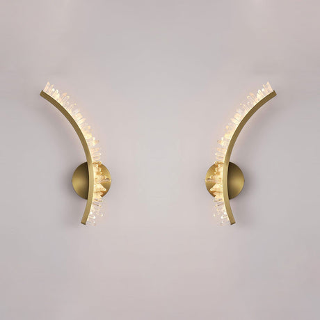 The left and right arms shown apart on a pale wall, each on its own round plate