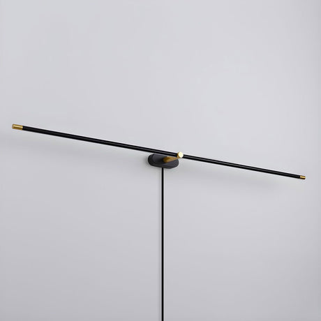 The black rod seen unlit, a thin bar crossing a small central hub
