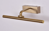 The short reach bracket seen at an angle, a plain yoke holding the tube