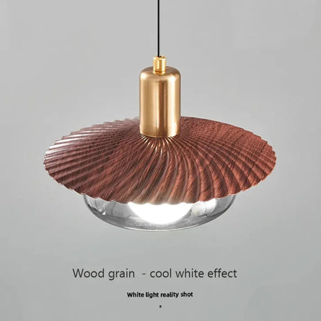 The disc lit with cool white light showing the smoked glass below the grain