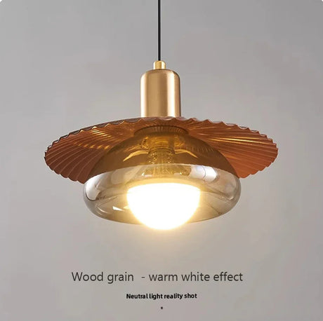 Close view of the ribbed walnut grain pattern on the upper disc