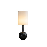 The black version of the lamp seen from the front, unlit
