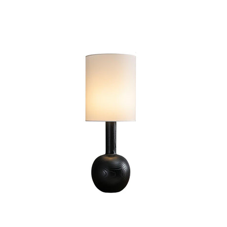 The black version of the lamp seen from the front, unlit