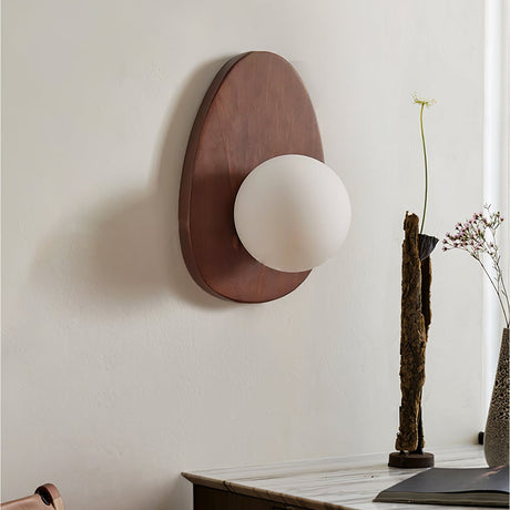 The plate at an angle showing how far the opal globe stands out from it