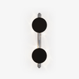Wall light with two black discs on a polished rod, soft light rippling behind them