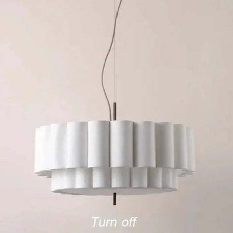White drum pendant light unlit, showing the plain white fabric of both tiers