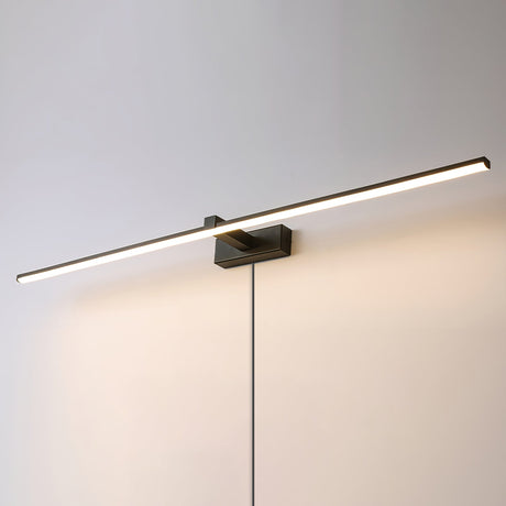 The bar seen at an angle, the cord leaving the block below the flat section