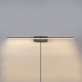 The dark version lit on a gray wall, a flat bar washing light down the plaster