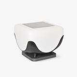 Rounded white cube lantern with a solar panel let into the flat top