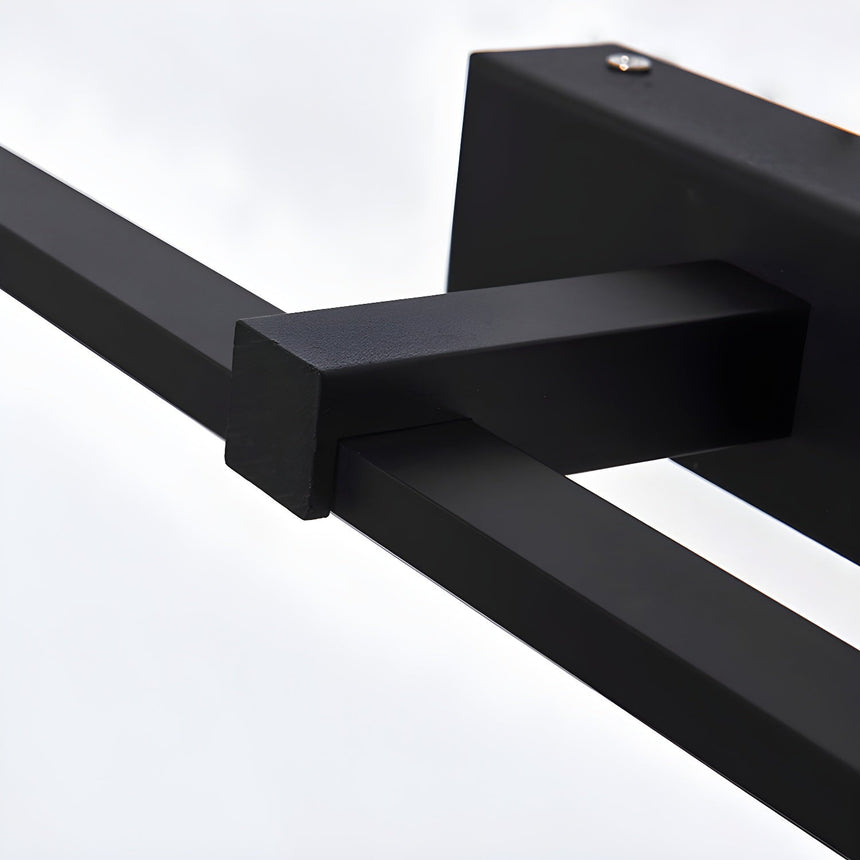 Close view of the offset block where the bar meets the wall plate