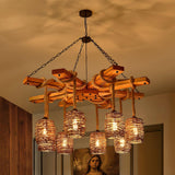The timber beams and rope wrapping seen lit from below, shades glowing amber