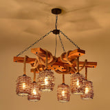 Lit under a warm toned ceiling, the six woven shades glowing under the crossed timber beams