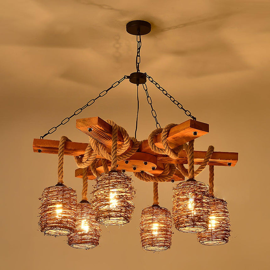 Lit under a warm toned ceiling, the six woven shades glowing under the crossed timber beams