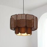 Close view of the brown scalloped wicker shade and its overlapping tiers