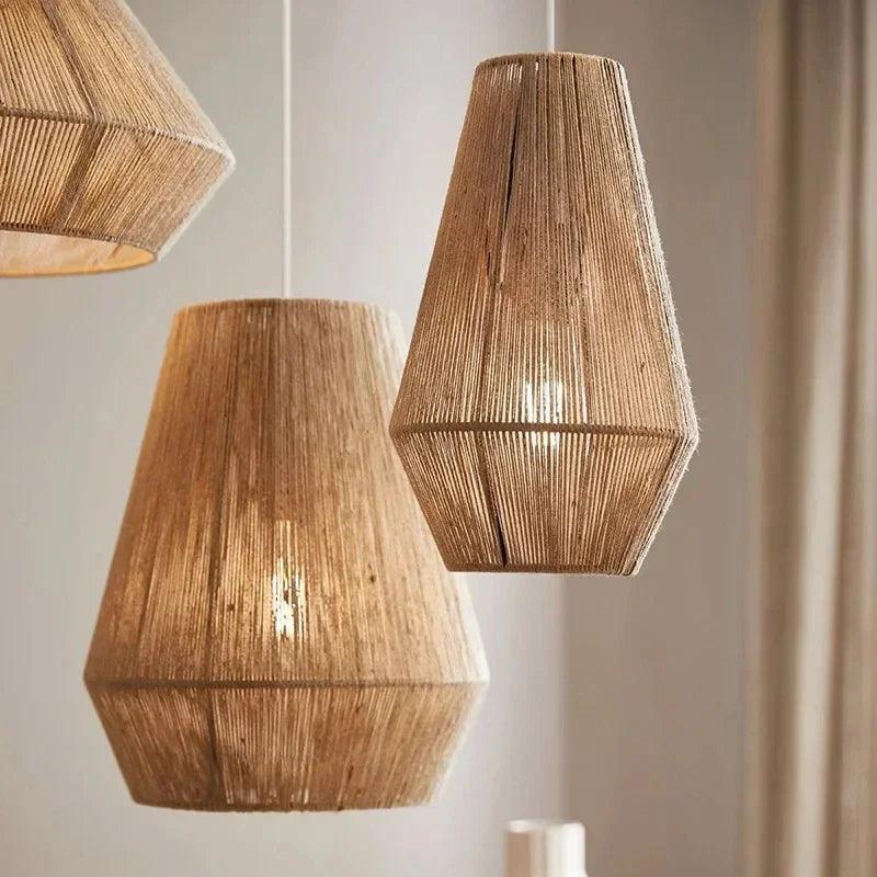 Wicker hanging lamp with a flat woven dome lit in a bright room