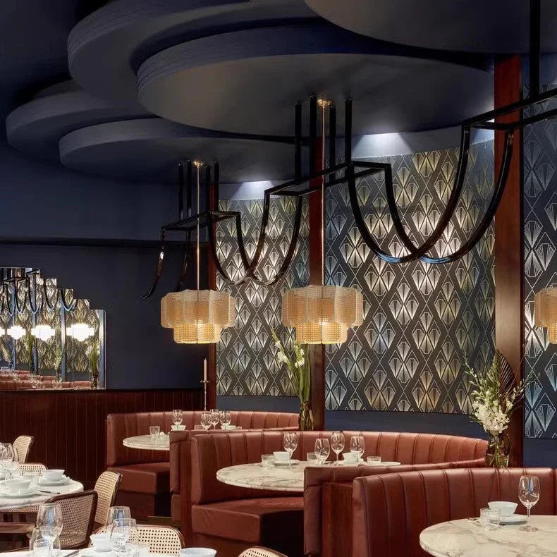 Several wicker hanging lamps in a restaurant interior