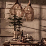 Cluster of wicker teardrops hung at staggered heights