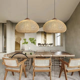 Row of wicker domes above a long dining table