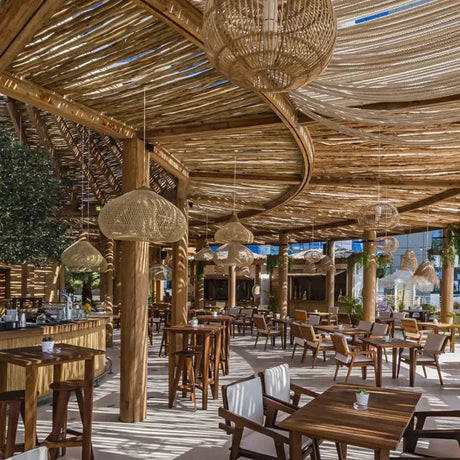 Wicker shades under a covered terrace roof