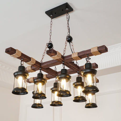 The crossed beams and lanterns lit, brass rims showing under each glass