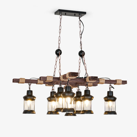 Two crossed wood beams carrying eight small caged glass lanterns on short drops
