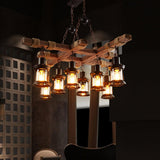 Lit in a dark room, the lantern glasses reading warm against the beams