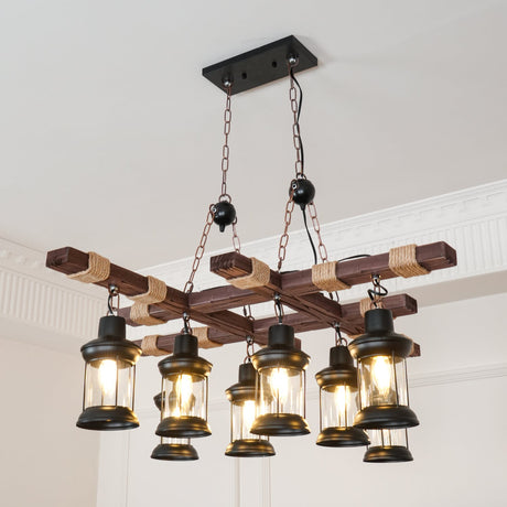 The eight lanterns lit in a pale paneled room with a framed print on the wall below