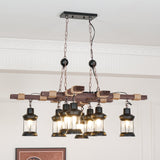 The fitting seen from the side in a pale room, lanterns lit at staggered heights