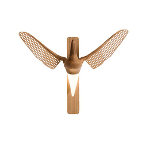 The pale wood version with both wings spread and the diffuser lit