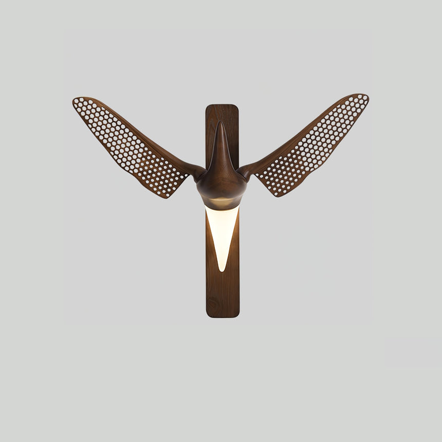 The walnut version seen from the front, wings raised either side