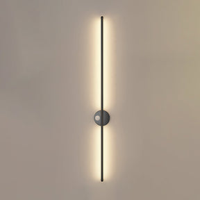 The black rod lit from top to bottom, the round hub catching the light