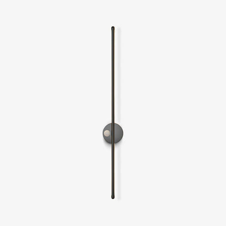 A slim black rod on a round hub, standing vertical and switched off
