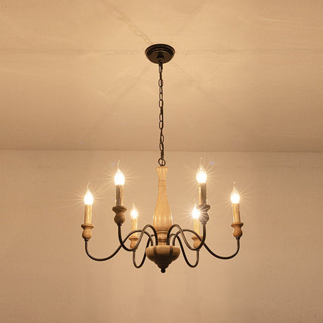 Seen from below against a warm ceiling, the six bulbs bright around the column