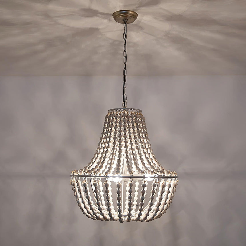 Lit close under a ceiling, the strands throwing a soft radiating shadow