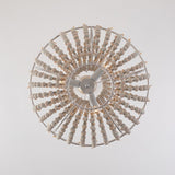 Seen from directly below, the strands radiating out from the metal rings