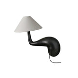Wood desk lamp in black seen from the front, plain ground