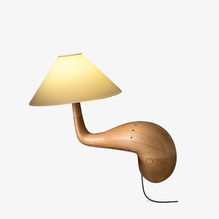 Wood desk lamp with a carved cantilever arm and white cone shade, plain ground