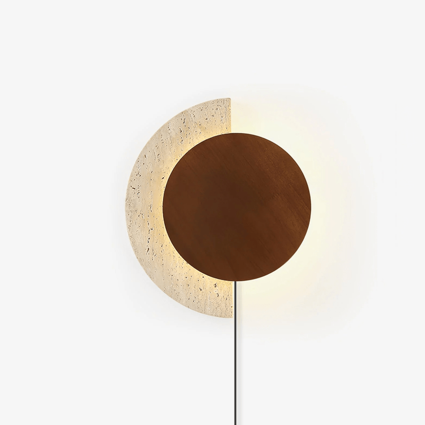 Wood plug in wall sconce, a walnut disc over a travertine crescent