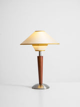 Wood table lamp with the beige two tier shade on a plain background