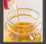 AureaMist Glass Oil Sprayer spraying olive oil demo - OpalDwell